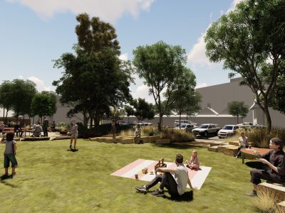An artists render of the central lawn area within the expanded Pakington Street Reserve